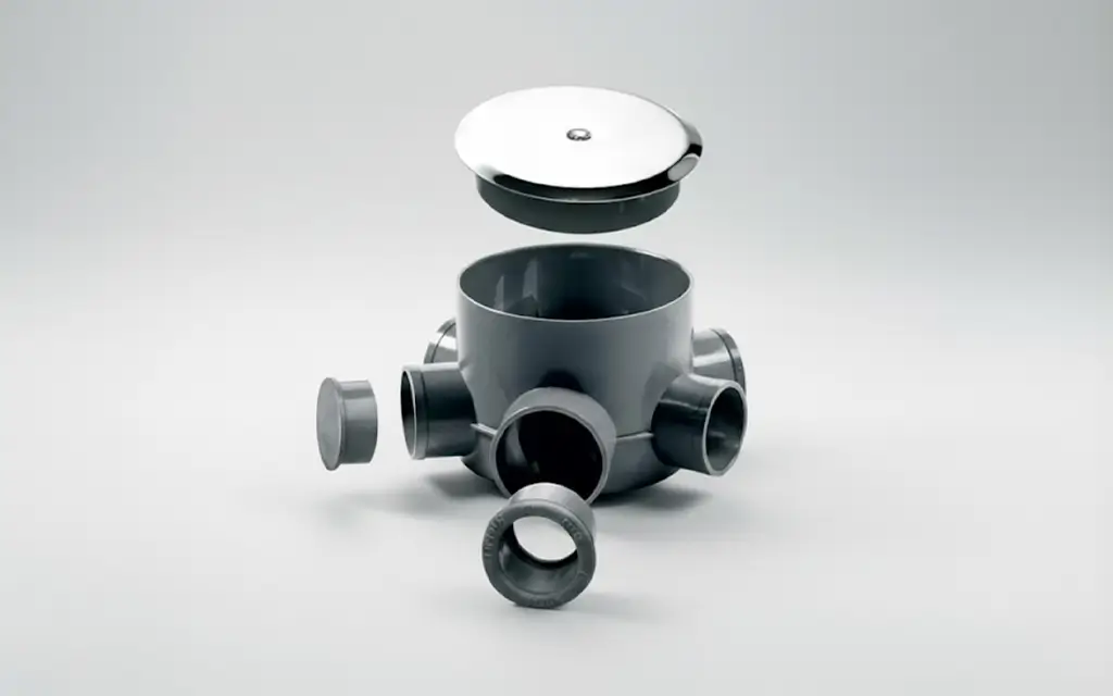 Bote sifónico modular centrado, mostrando sus componentes y tapa, como imagen principal de la guía completa sobre qué es y cómo funciona.